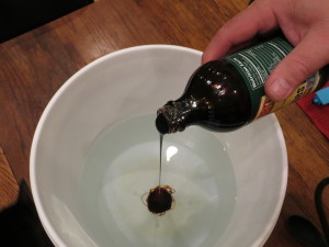 Adding molassese while making worm tea at home